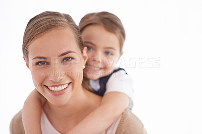 Buy stock photo Mother, child and piggyback in portrait in studio with games, love and bonding with smile while playing on white background. Playful woman, young girl and happy with fun time together for childhood
