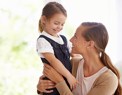 Buy stock photo Smile, mother and young girl at home bonding, love and embracing in backyard. Happy, family and nurturing with hug and affection, hold and parent with daughter while sharing moment for mothers day