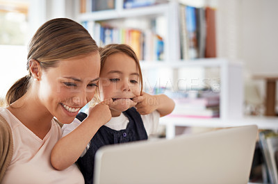 Buy stock photo Laptop, video call or funny face with mother and daughter on sofa in living room of home to study together. School, distance education or elearning with woman parent and girl child in apartment