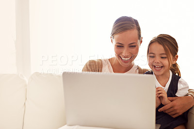 Buy stock photo Laptop, education or funny with mother and daughter on sofa in living room of home to study together. School, remote lesson or elearning with woman parent and girl child laughing in apartment