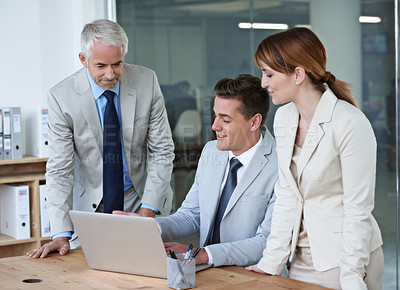 Buy stock photo Computer, meeting and business people in office for research on corporate legal project in collaboration. Team, technology and group of attorneys work on law case with laptop in workplace boardroom.