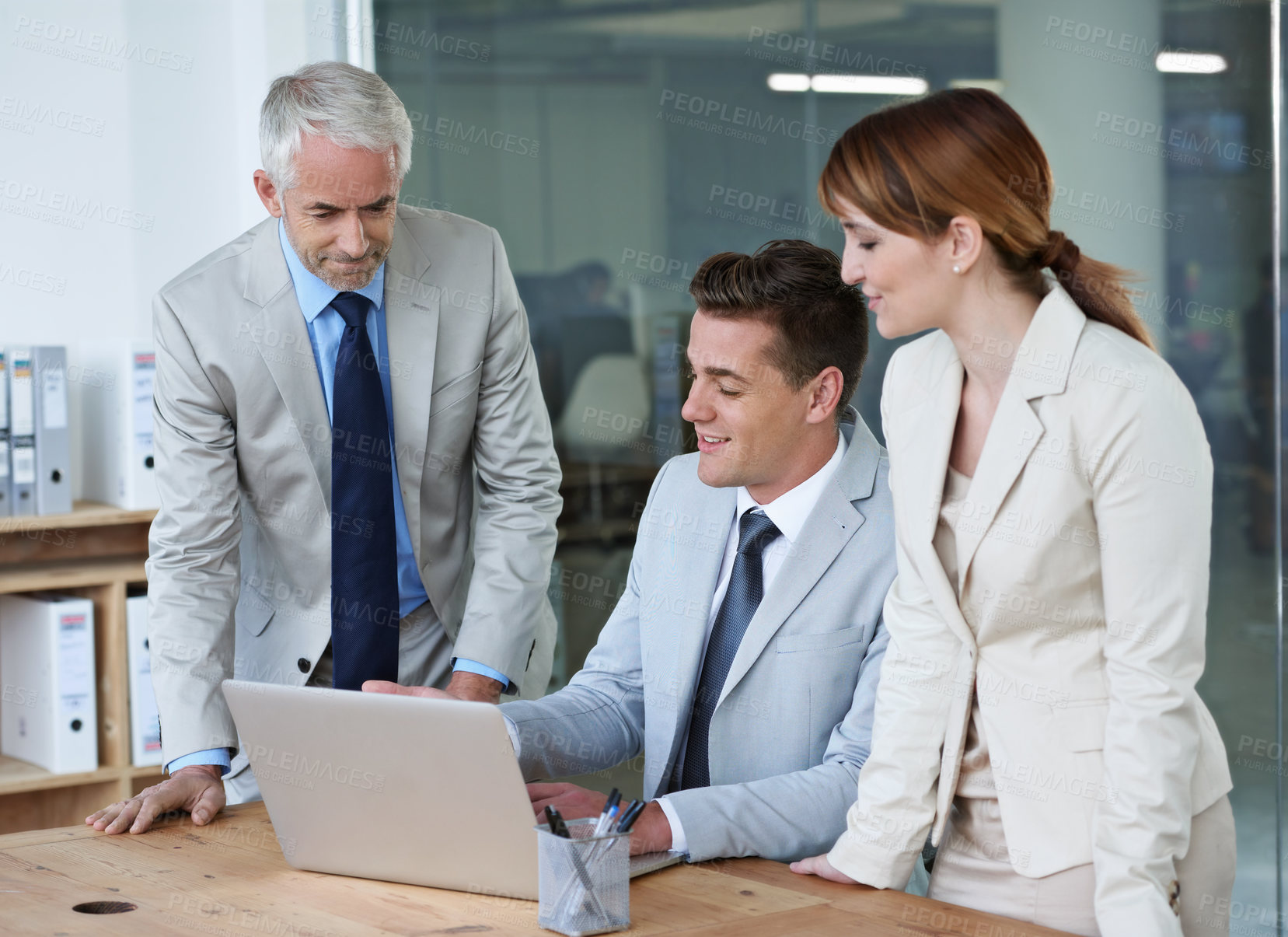 Buy stock photo Computer, meeting and business people in office for research on corporate legal project in collaboration. Team, technology and group of attorneys work on law case with laptop in workplace boardroom.