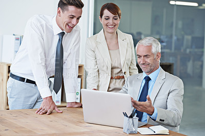Buy stock photo Business people, laptop and happy discussion in boardroom, communication and meeting in office. Senior manager, employees and technology for assistance in training, mentor and advice for support