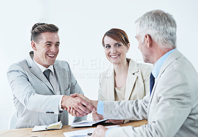 Buy stock photo Handshake, happy business people or smile for partnership agreement or b2b deal in meeting. Shaking hands, start or excited corporate lawyers in collaboration for teamwork with contract or paperwork