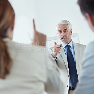 Buy stock photo Presentation, speaker and person in meeting with question for training, coach and mature mentor with advice. People, learning and confused by seminar idea or teaching team, strategy and explain plan