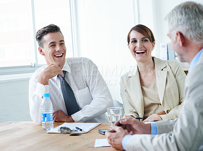 Buy stock photo Teamwork, happy and business people laughing in a meeting for planning growth strategy ideas. Smile, humor and CEO speaking of a funny joke with group of employees, colleagues or workers in boardroom