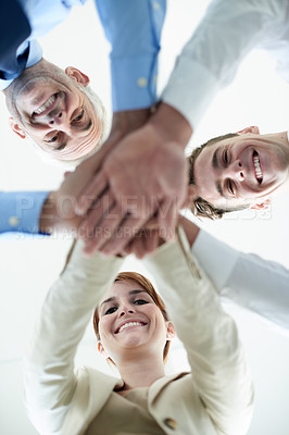 Buy stock photo Low angle, business people and portrait with hands, stack and partnership with cooperation. Face, group and manager with employees or huddle with team building or collaboration for a project or ideas