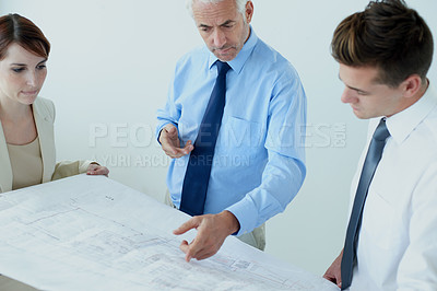 Buy stock photo Blueprint, people or civil engineering team in office planning project, maintenance or renovation in meeting. Architecture, building or designers with floor plan for property development ideas  