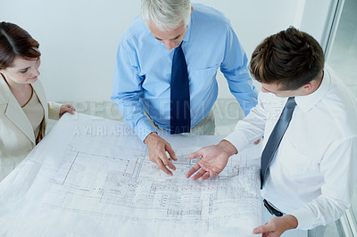 Buy stock photo Blueprint, above or civil engineering team planning project, maintenance or renovation in meeting. Architecture, people building or group of designers with floor plan ideas for property development