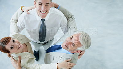 Buy stock photo Business people, portrait and huddle for solidarity or support in workplace, teamwork and together. Coworkers, top view and united in embrace or coworkers in office, collaboration and hug in meeting