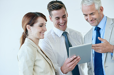 Buy stock photo Business people, tablet and support or online for partnership, communication and meeting in office. Coworkers, collaboration and humor in research and laughing, planning and teamwork in workplace