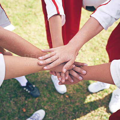 Buy stock photo Hands, huddle and solidarity in children soccer team, team building and collaboration or support in circle. People, group and teamwork or partnership and trust in community, unity and connection