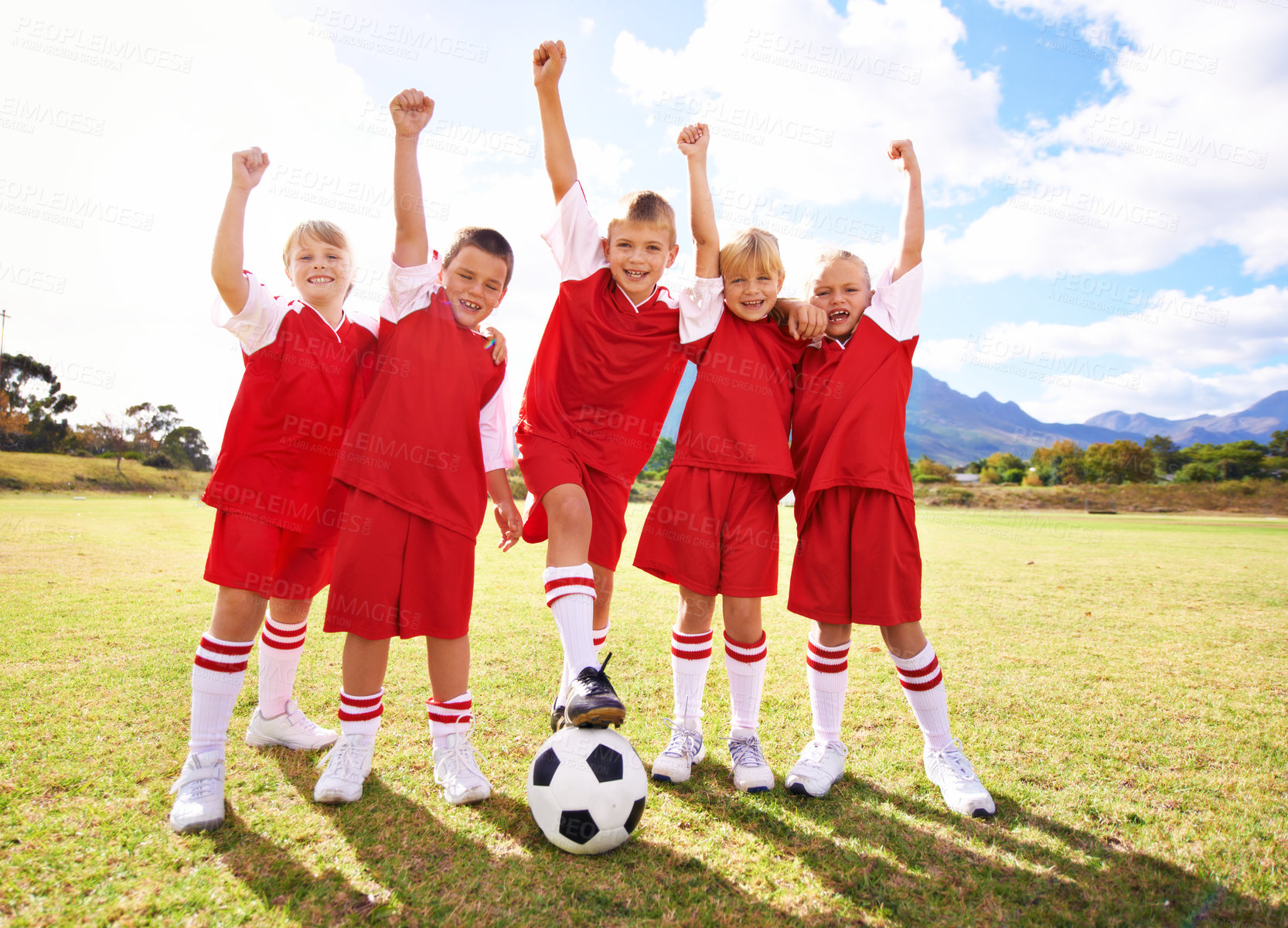 Buy stock photo Children, soccer team and celebration for winning or success, happy and victory in outdoors. People, kids and fist pump for achievement, collaboration and partnership or teamwork on field or sport