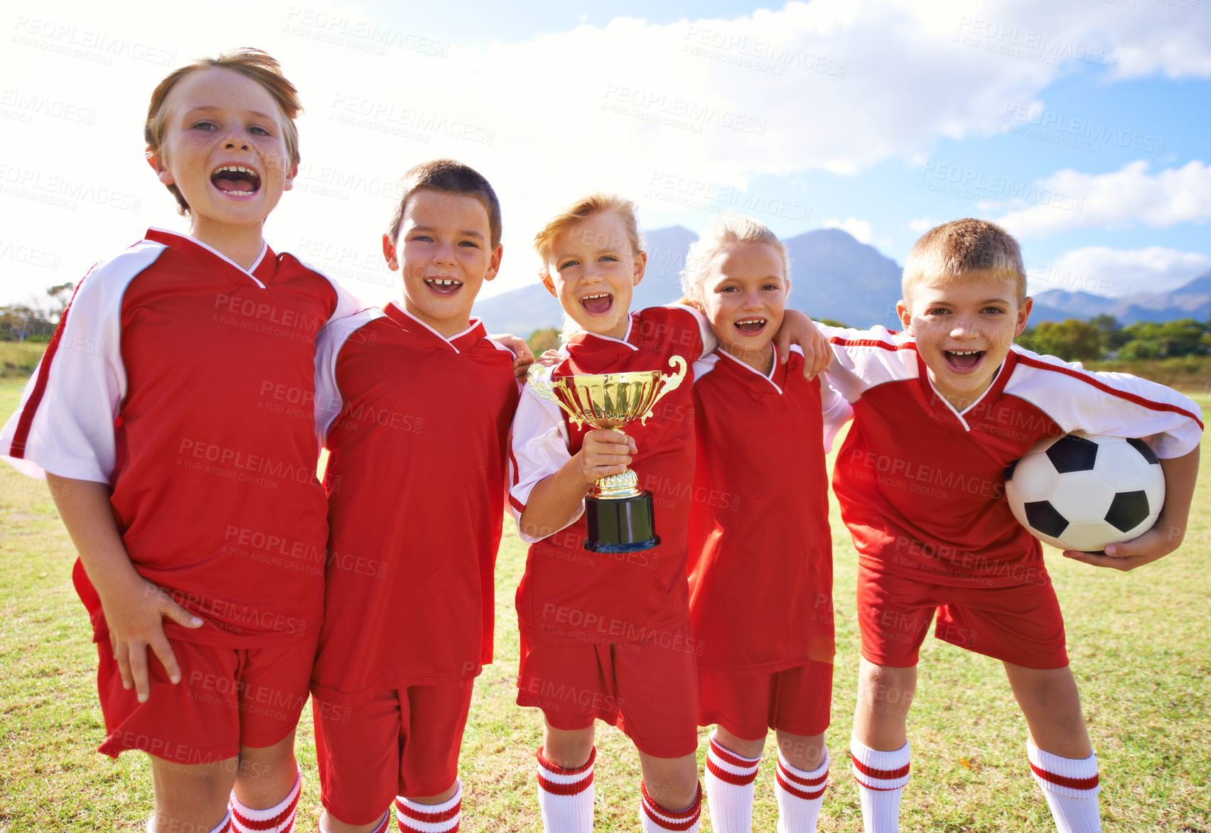 Buy stock photo Victory, soccer team and children with cup, boys and girls with pride, support or proud. Achievement, sports and friendship, together and happy for win, ready for game and physical activity
