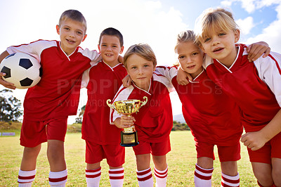 Buy stock photo Players, soccer team and children with cup, victory and girls with boys, support or proud. Achievement, sports and friendship, together and happy for win, ready for game or physical activity
