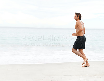 Buy stock photo Man, music and running on beach cardio workout, exercise playlist or summer sport training. Male person, streaming listening and fitness at sea or headphones speed performance, healthy body or audio