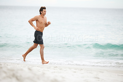 Buy stock photo Man, music and running on beach training workout, cardio playlist or summer sport exercise. Male person, streaming listening and fitness at sea or headphones speed performance, healthy body or audio