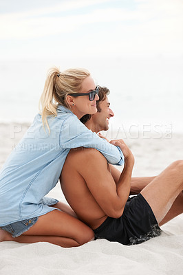 Buy stock photo Couple, beach sand and hug smile for summer relax, outdoor holiday or romance vacation. Man, woman and happy for ocean fresh air in embrace or connection love, trust together or peace in sunshine