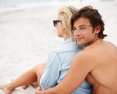 Buy stock photo Couple, beach sand and sitting embrace on holiday vacation, sunshine lovers or sea salt hair. Man, portrait or woman relax for partnership connection or ocean view, romantic or summer tropical travel