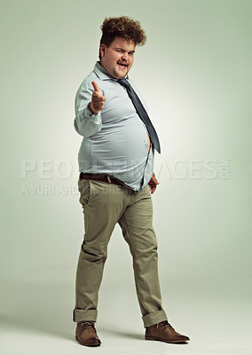 Buy stock photo Full length shot of an overweight man pointing at the camera