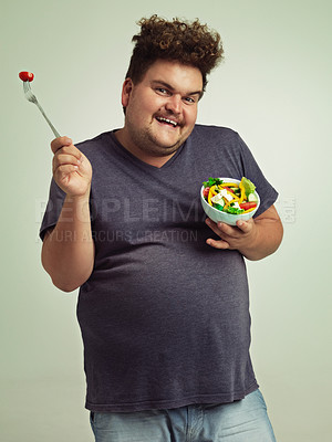 Buy stock photo Studio, portrait and overweight man with salad for weight loss, diet and healthy meal with nutrition. Obese, male person and smile with organic food for detox, lifestyle change and vitamin c benefits