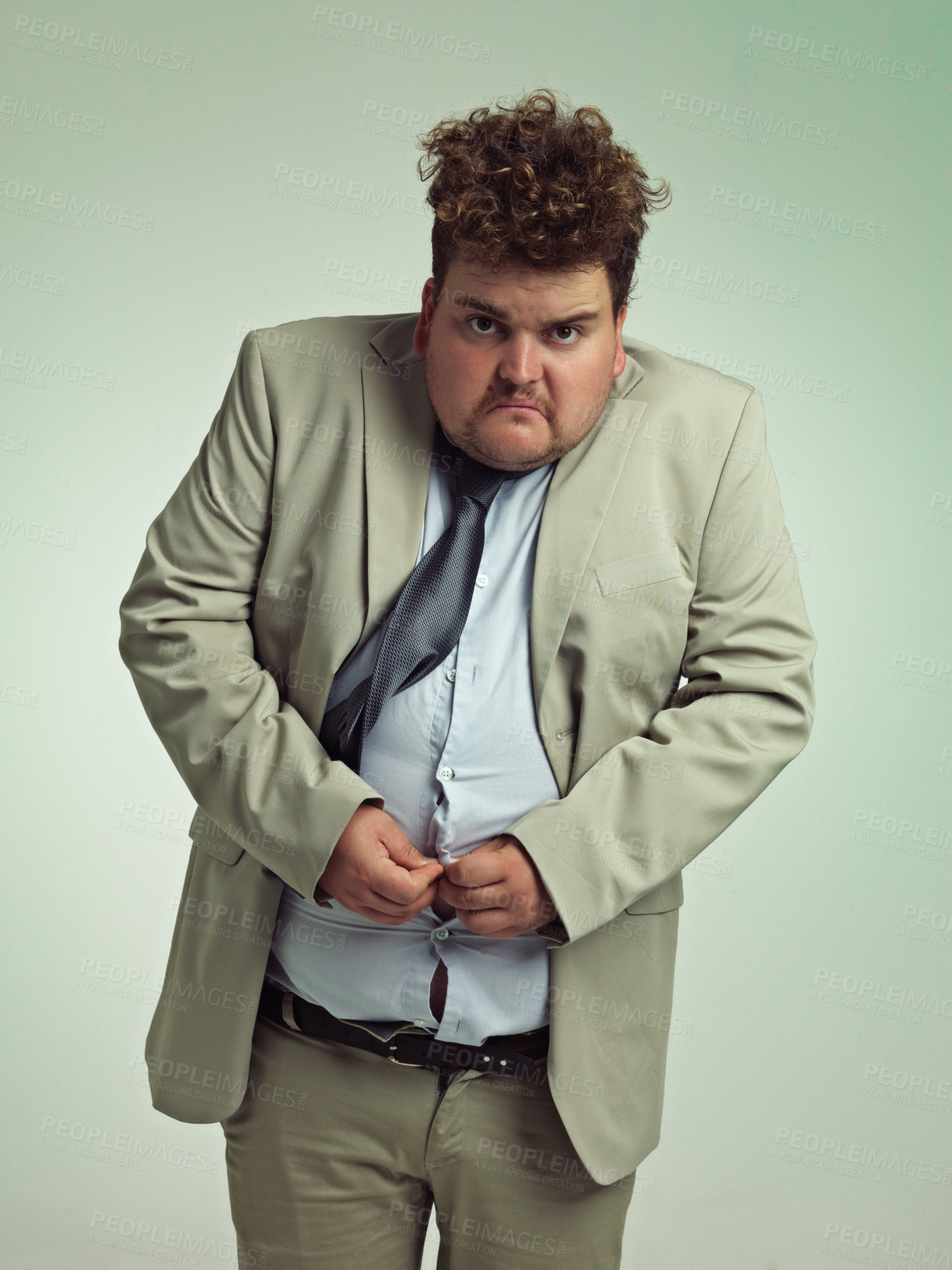 Buy stock photo Portrait, plus size and man with stomach in shirt for suit, professional and annoyed with clothes for work. Employee, male person and guy with unhappy with fail of belly in attire for job in studio
