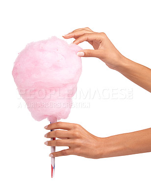 Buy stock photo Candy floss, sweet and woman hands isolated on a white background for eating, pink food and holiday treat. Person hand holding cotton, color cone for youth birthday, childhood and festival in studio