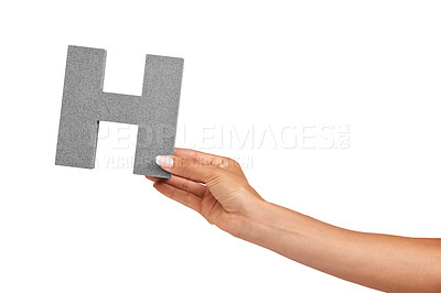 Buy stock photo Hand of woman, capital letter H and presentation of font isolated on white background. Character, upper case and person with English alphabet typeface for communication, reading and writing in studio