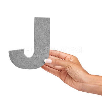 Buy stock photo Hand of woman, capital letter J and presentation of consonant isolated on white background. Character, font and palm with English alphabet typeface for communication, reading and writing in studio.