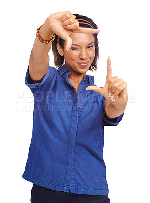 Buy stock photo Portrait of woman, wink and frame in studio for selfie, photo or profile picture against white background. Female person, border face and smile in focus for photography, social media or capture