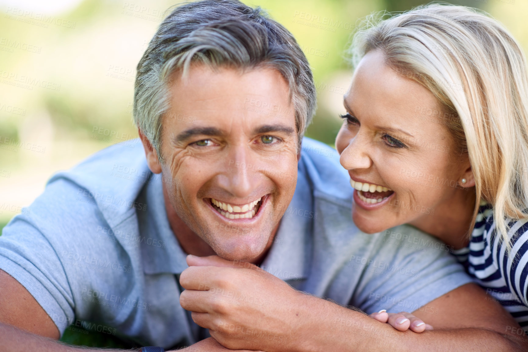 Buy stock photo Cropped portrait of an affectionate mature couple in the park