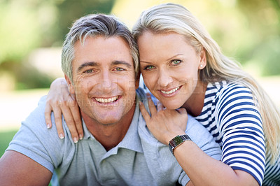 Buy stock photo Cropped portrait of an affectionate mature couple in the park