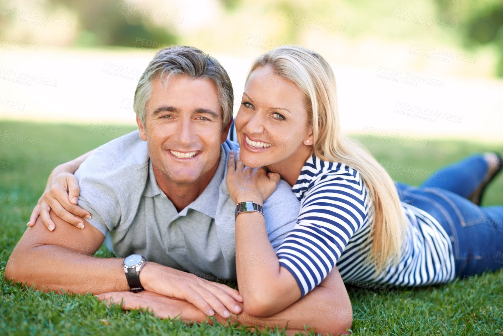 Buy stock photo Cropped portrait of an affectionate mature couple in the park