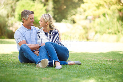 Buy stock photo Full length shot of an affectionate mature couple in the park