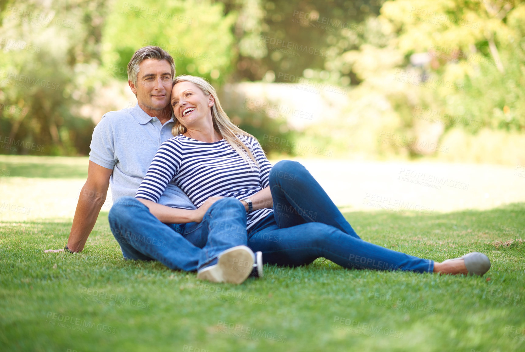 Buy stock photo Mature couple, happy and sitting on grass for healthy marriage, love relationship and outdoor bonding. Smile, relax and man with woman for support, loyalty and romantic time together in nature park