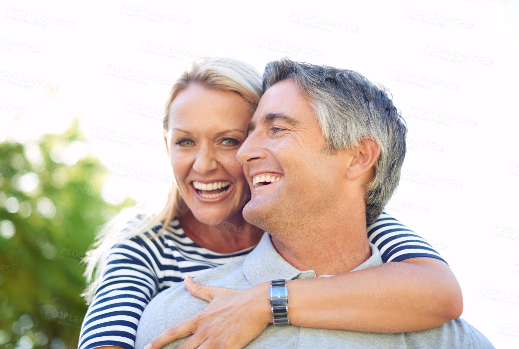 Buy stock photo Hug, love and smile with couple in park together for anniversary, bonding or romance. Adventure, piggyback or travel with mature man and woman outdoor in nature for summer holiday or vacation