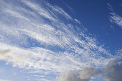 Buy stock photo Nature, blue sky and streak of clouds as background for natural beauty, atmosphere and weather. Wallpaper, sunshine and scenic view in air for environment, heaven and cloudscape in morning outdoors