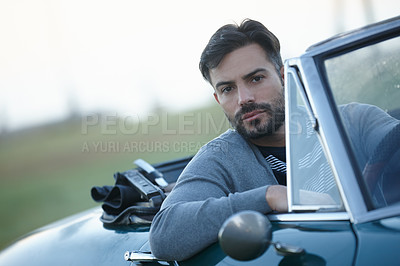 Buy stock photo Portrait, road trip and man in car in morning for solo holiday, outdoor travel or vacation. Driver, transport or confident male person in classic motor vehicle for adventure, journey or weekend break