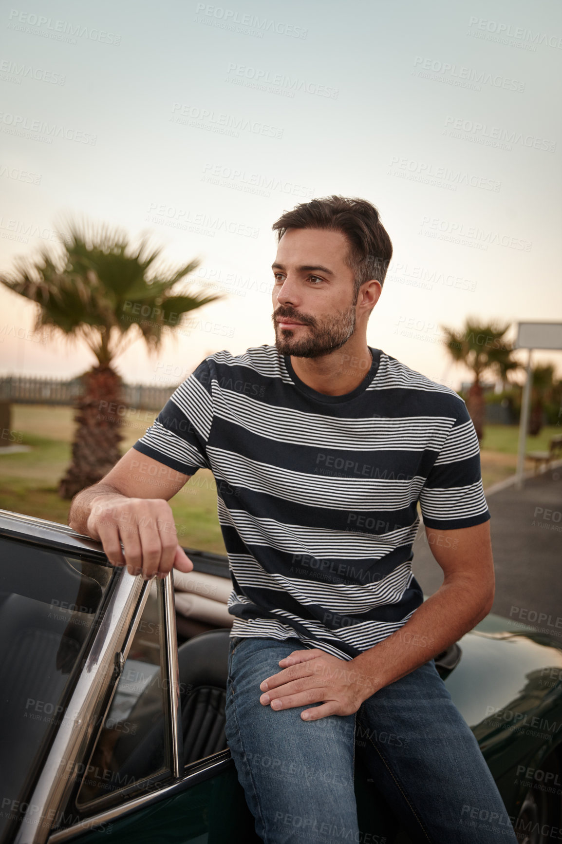 Buy stock photo Thinking, road trip and man in car in park for solo holiday, outdoor travel or scenic vacation. Driver, transport or confident person in classic motor vehicle for adventure, journey or weekend break
