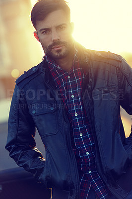 Buy stock photo Cropped shot of a handsome young man outdoors