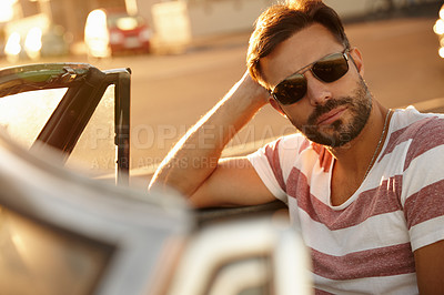 Buy stock photo Shot of a handsome young man on a roadtrip