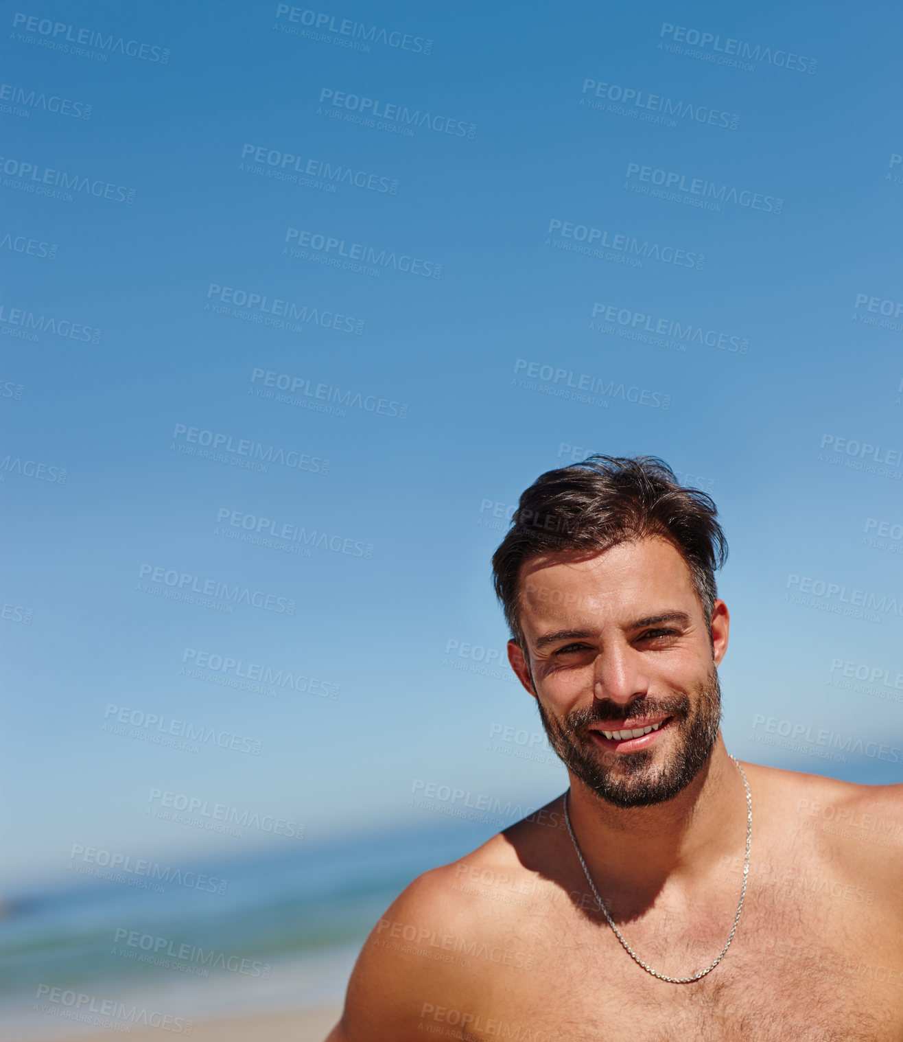 Buy stock photo Portrait, beach and man with blue sky, vacation and relax with weekend break, tropical island and space. Face, seaside and person with journey, summer holiday and travel with tourism and Zanzibar