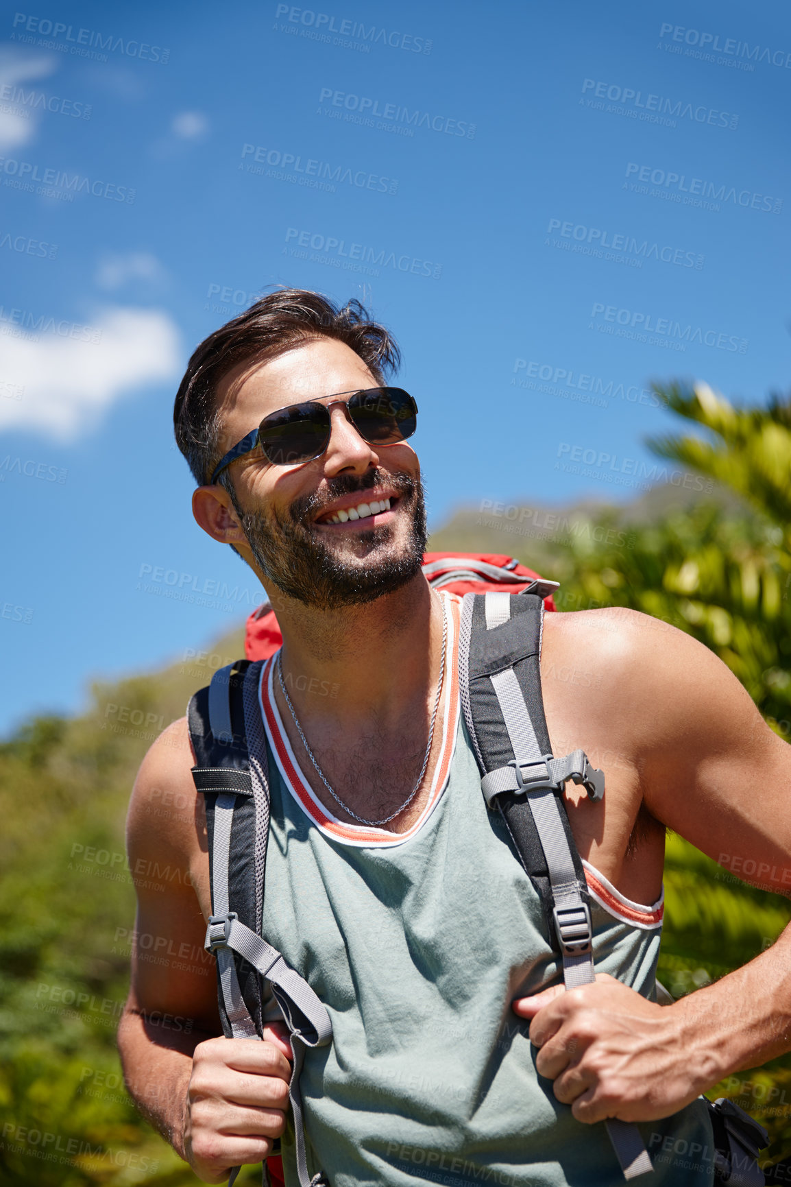 Buy stock photo A hiker with a backpack on his back