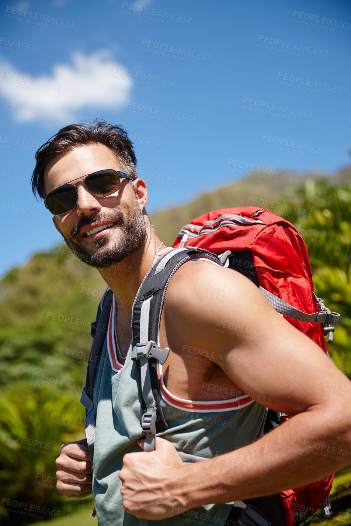 Buy stock photo A hiker with a backpack on his back