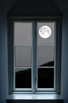 The moon looking through the window