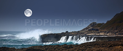 Buy stock photo Dark, moon and waves in ocean for landscape, natural beauty or peace with environment. Night, sea and rocky coastline with planet glow or energy in summer, water storm on vacation in Mauritius