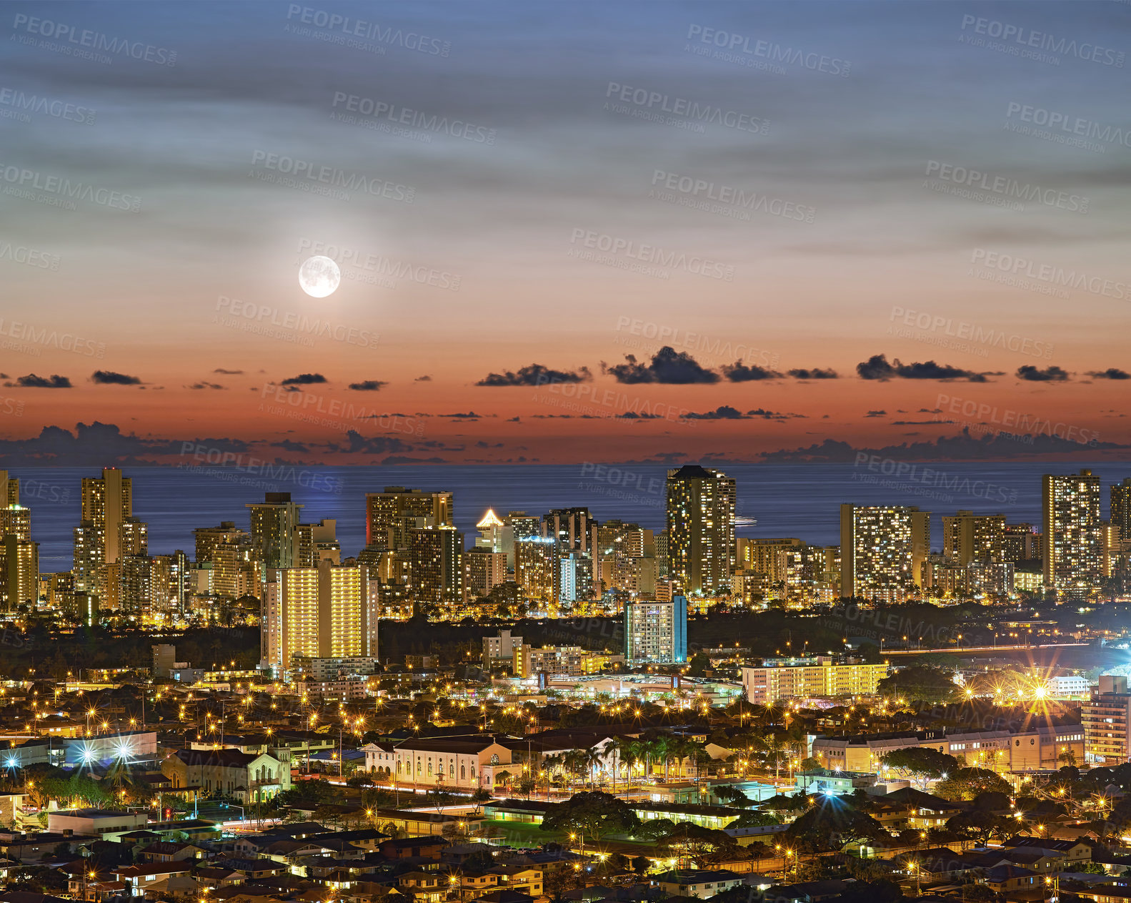 Buy stock photo A photo of the moon over Honolulu, Hawaii