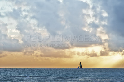 Buy stock photo Clouds, sky and boat in ocean at sunset for sailing, outdoor environment and wallpaper of nature. Earth, water and background of sea with yacht for holiday, peace and travel destination in Greece