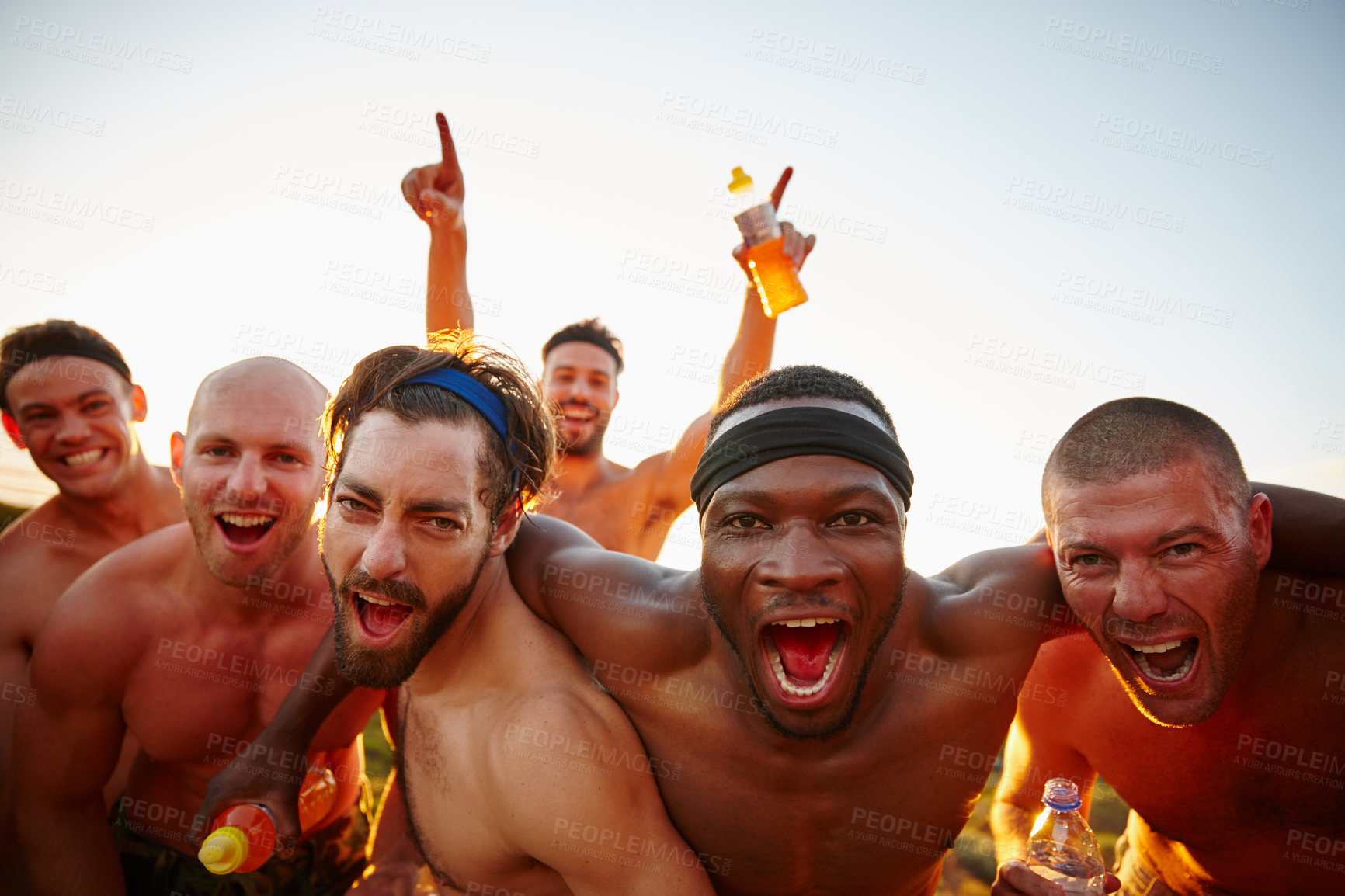 Buy stock photo Cropped portrait of a group of macho male friends shouting in excitement in the outdoors