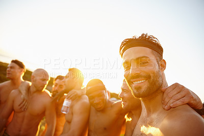 Buy stock photo Cropped portrait of a group of sporty male friends spending time in the outdoors